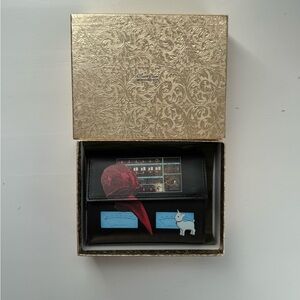 Undercover black trifold wallet